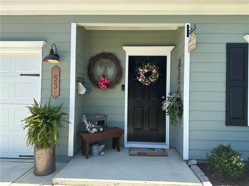 53 Bennett Way Rome, GA 30161 - Photo 29 of 42 a view of a entryway door of the house with outdoor seating