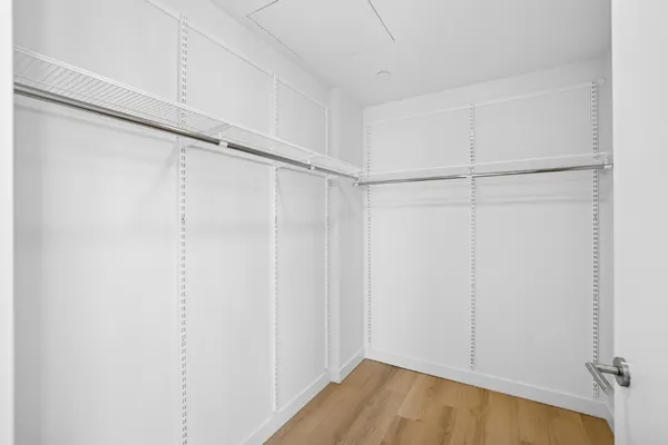 a view of an empty walk in closet