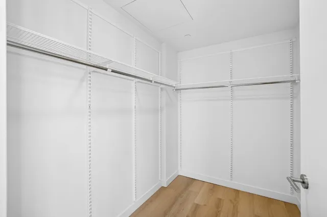 a view of an empty walk in closet