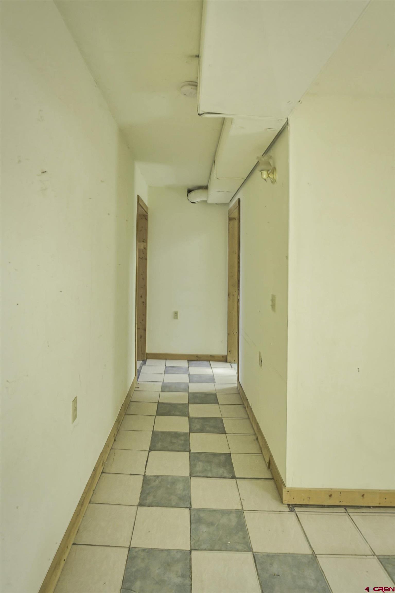 23500 Ridge Road Trinidad, CO 81082 - Photo 12 of 42 a view of a hallway with wooden floor