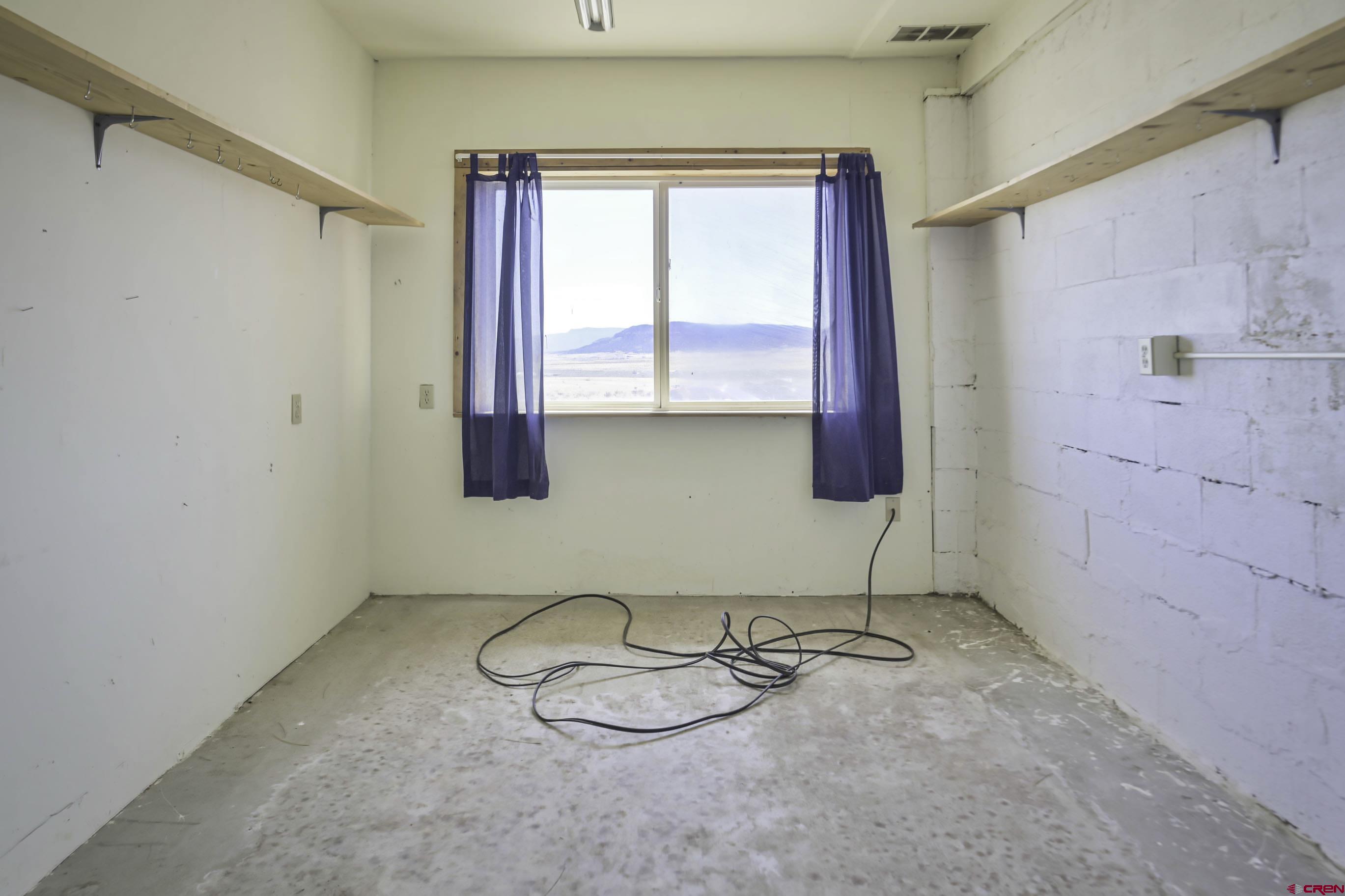 23500 Ridge Road Trinidad, CO 81082 - Photo 13 of 42 a bathroom with a sink and a mirror