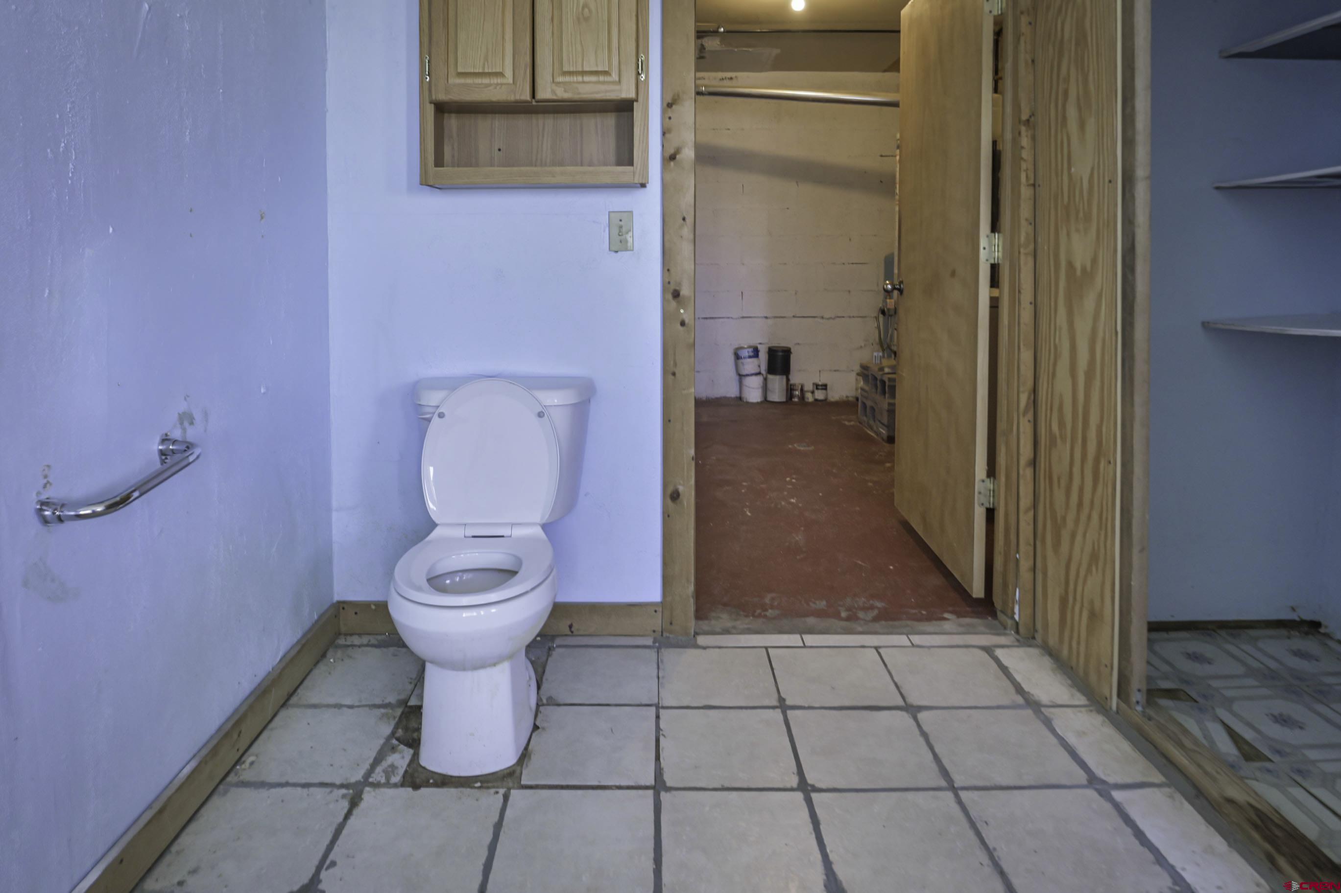 23500 Ridge Road Trinidad, CO 81082 - Photo 21 of 42 a bathroom with a toilet and a shower