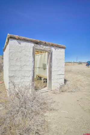 a view of an empty room with a fireplace