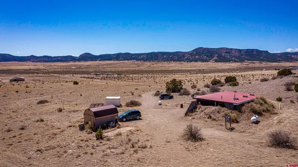 a view of a livingroom with trees