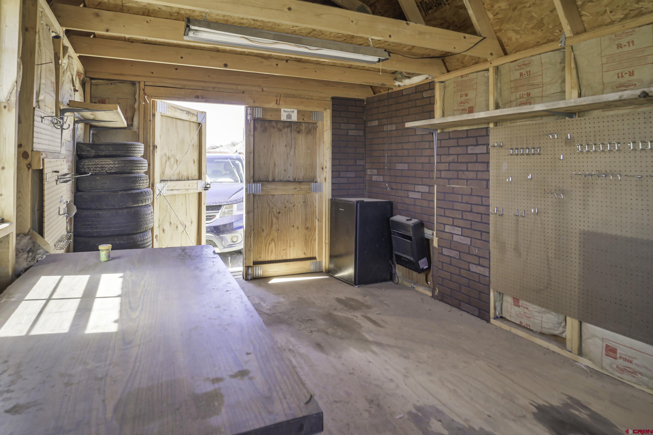 23500 Ridge Road Trinidad, CO 81082 - Photo 33 of 42 a view of an empty room with a fireplace