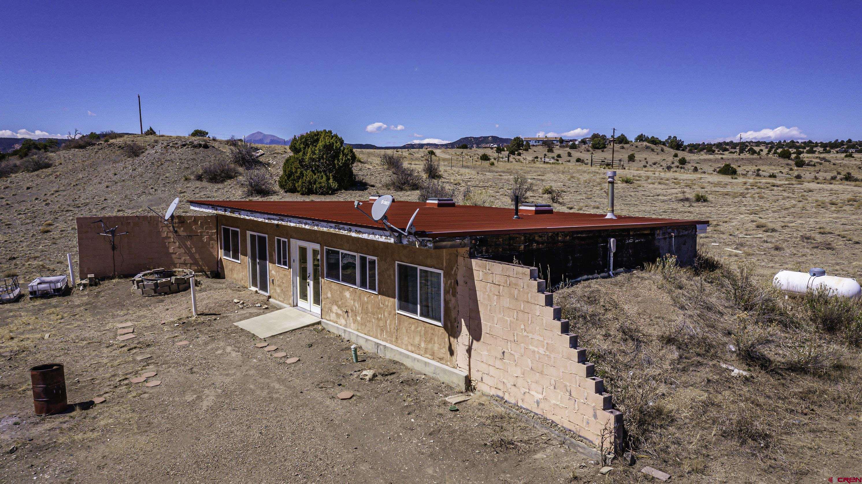 23500 Ridge Road Trinidad, CO 81082 - Photo 5 of 42 a view of a house with a yard
