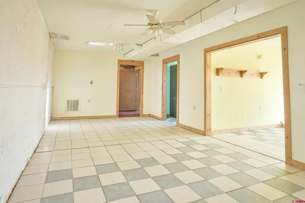 a kitchen with a stove and a cabinets