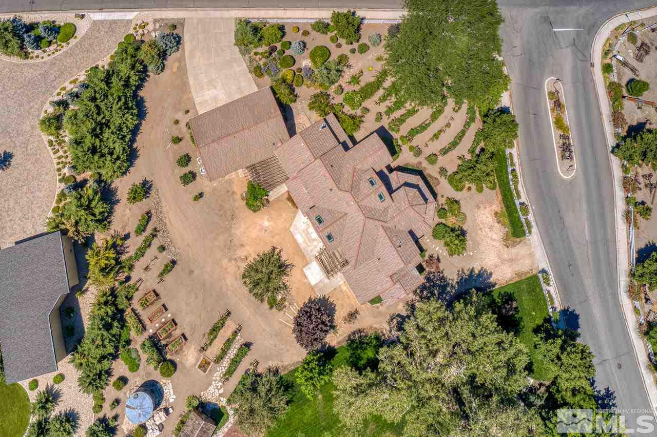 10049 Casazza Ranch Lane Reno, NV 89511 - Photo 40 of 40 an aerial view of a house with a yard and garden