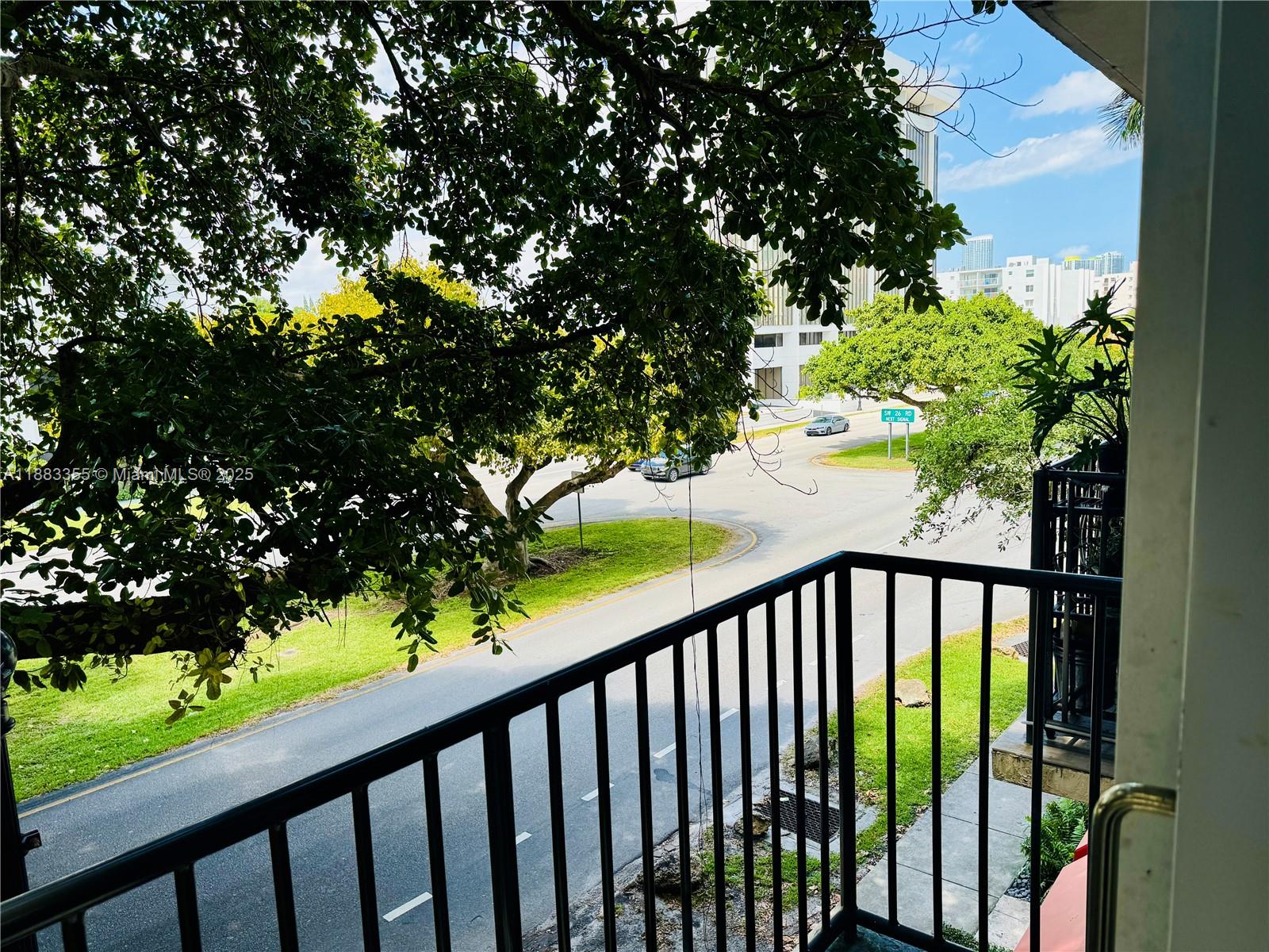 2701 Southwest 3rd Avenue, Unit 201 Miami, FL 33129 - Photo 11 of 16 a view of a balcony with a tree
