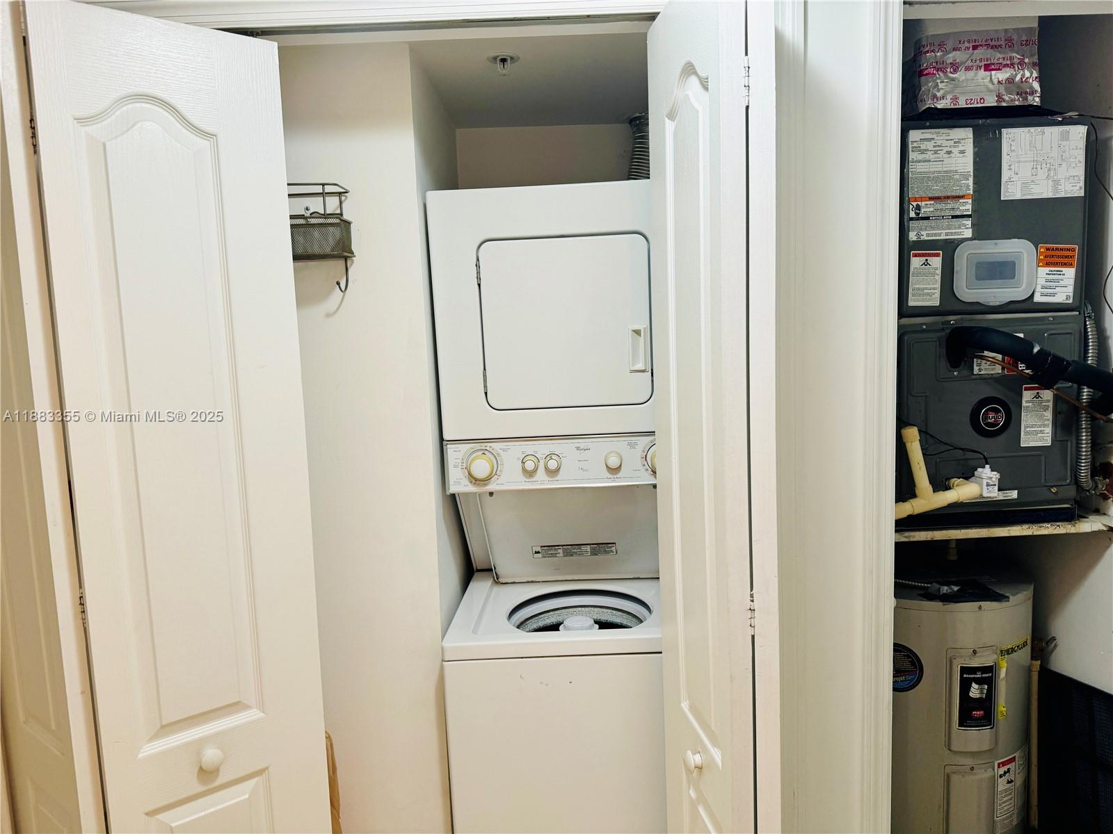 2701 Southwest 3rd Avenue, Unit 201 Miami, FL 33129 - Photo 14 of 16 a utility room with dryer and washer