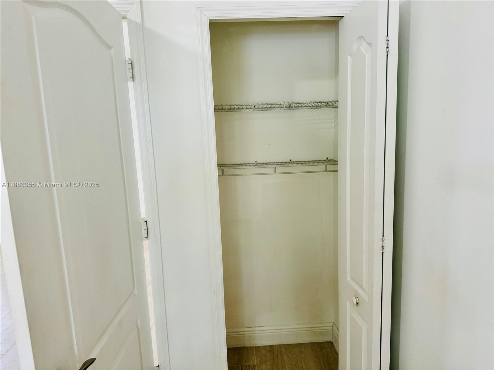 2701 Southwest 3rd Avenue, Unit 201 Miami, FL 33129 - Photo 9 of 16 a bathroom with a glass shower door