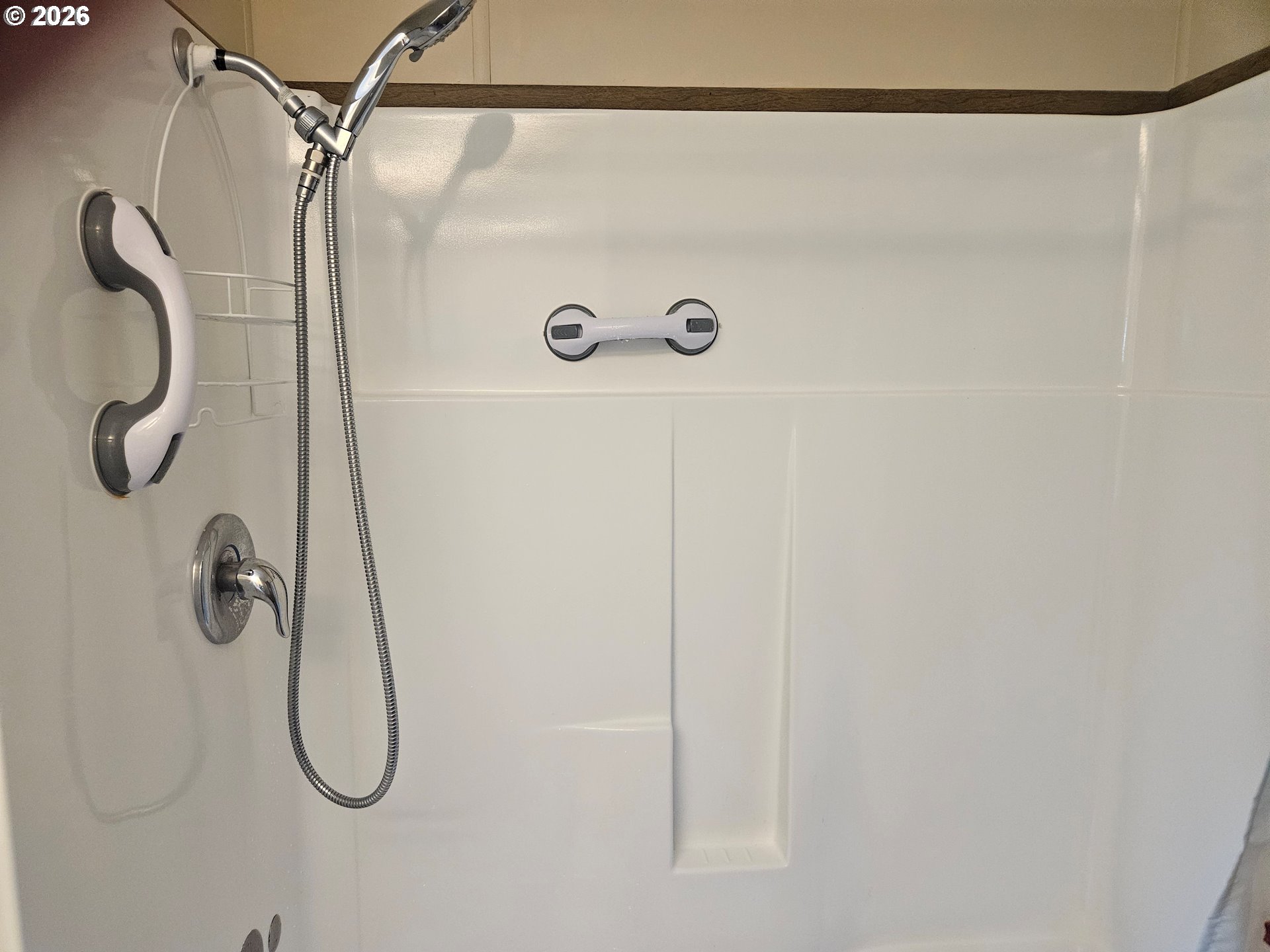 1600 Rhododendron Drive, Unit 214 Florence, OR 97439 - Photo 14 of 38 a bathroom with a shower