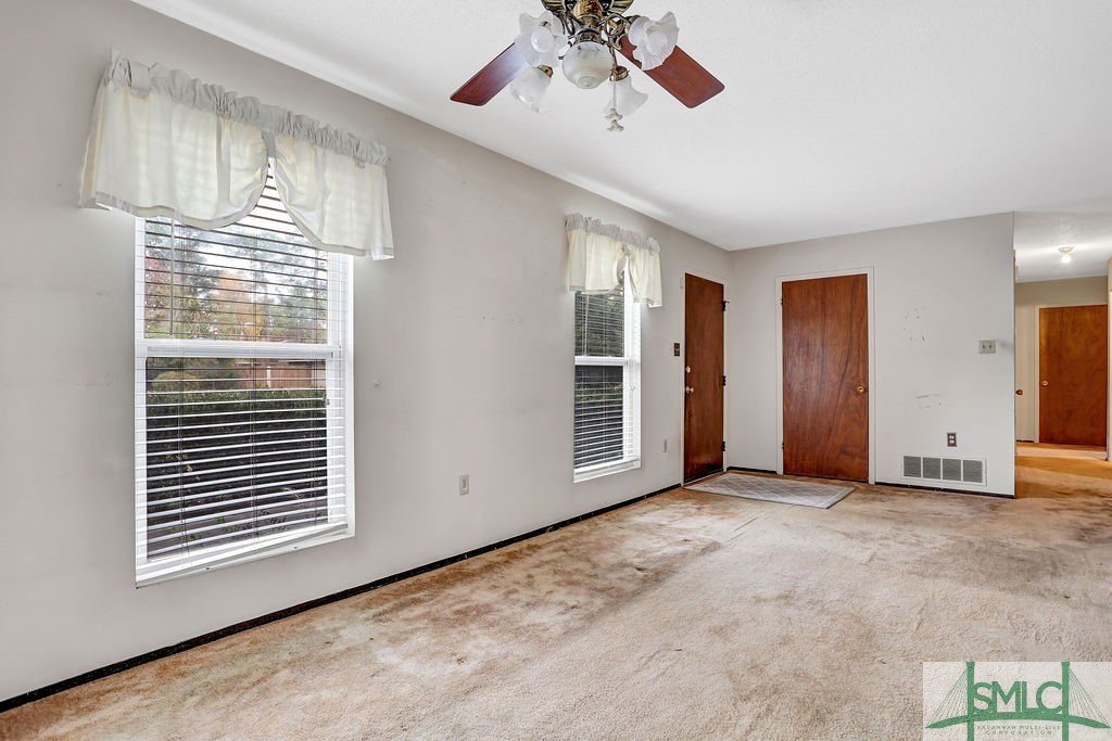107 Melrose Place Rincon, GA 31326 - Photo 2 of 50 Living Room/Dining Room Combo