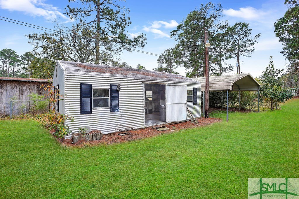 107 Melrose Place Rincon, GA 31326 - Photo 35 of 50 Storage Shed Pictures have been enhanced with gree