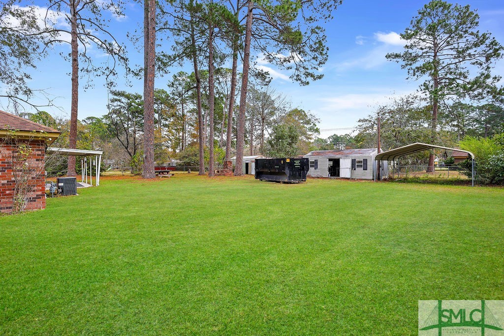 107 Melrose Place Rincon, GA 31326 - Photo 38 of 50 Pictures have been enhanced with green grass