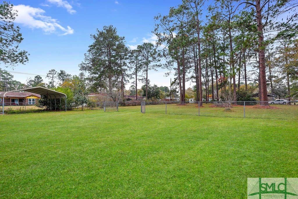 107 Melrose Place Rincon, GA 31326 - Photo 39 of 50 Pictures have been enhanced with green grass