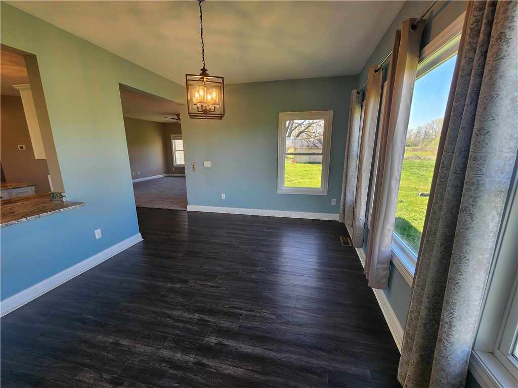 7441 Dodson Road Brookville, OH 45309 - Photo 47 of 50 This inviting space features large windows and sleek flooring, perfect for gatherings.