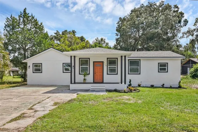 front view of a house and a yard