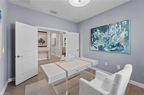 a view of livingroom with furniture wooden floor and window
