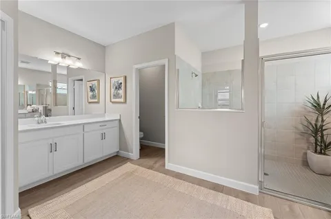 a view of a bathroom with mirror