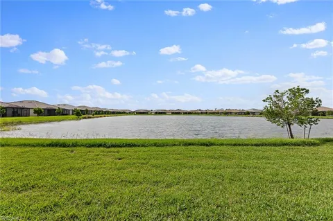 a view of a lake and a yard
