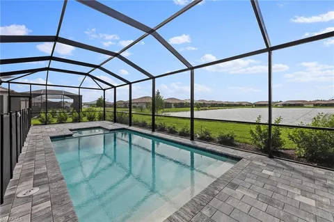 a view of a swimming pool with a porch