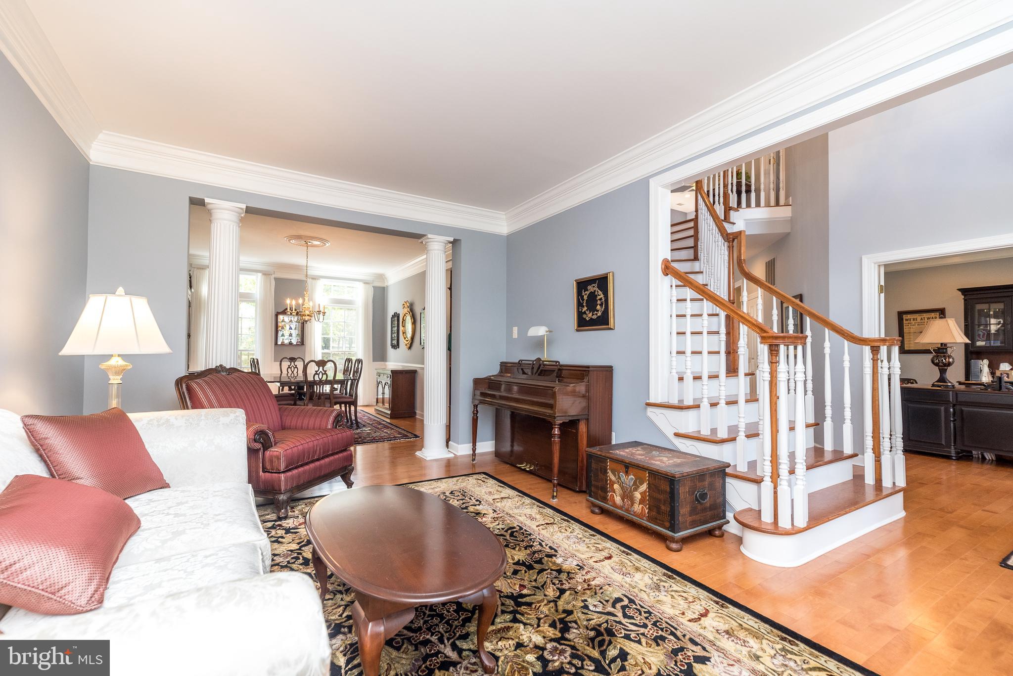 315 Kennard Road Perkasie, PA 18944 - Photo 8 of 51 a living room with fireplace furniture and a wooden floor
