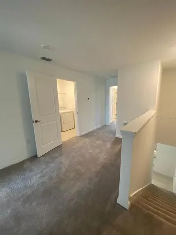 a view of a room with an empty room