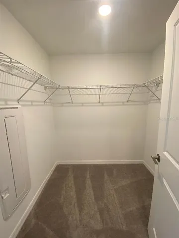 a view of a room with racks on the wall