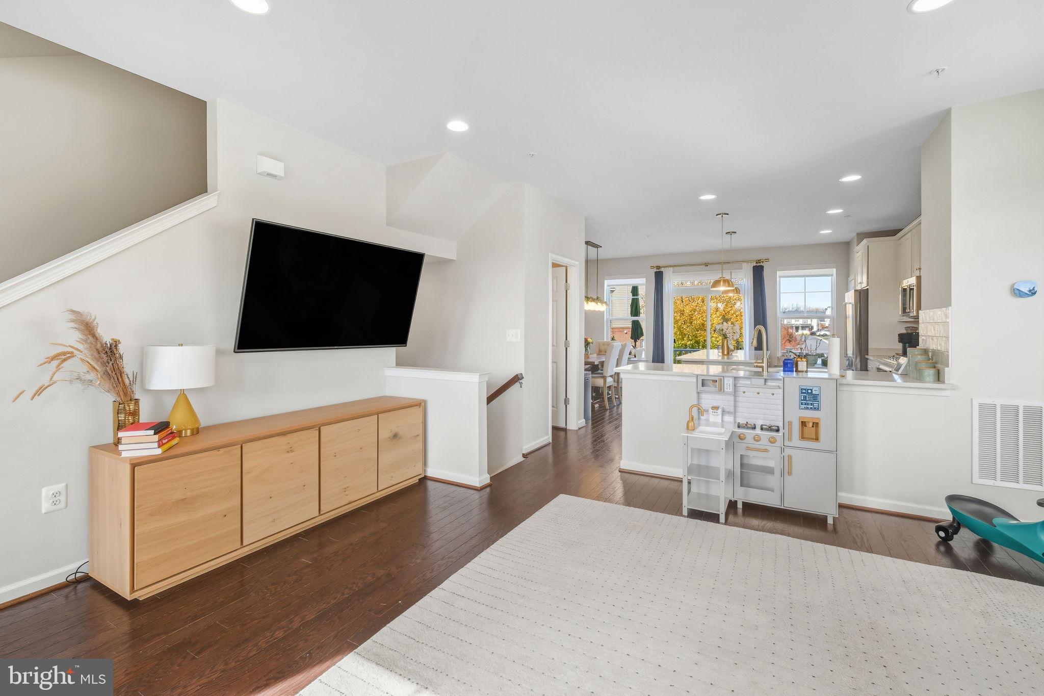 15635 Trolley Lane Silver Spring, MD 20906 - Photo 17 of 41 a view of living room with furniture and flat screen tv