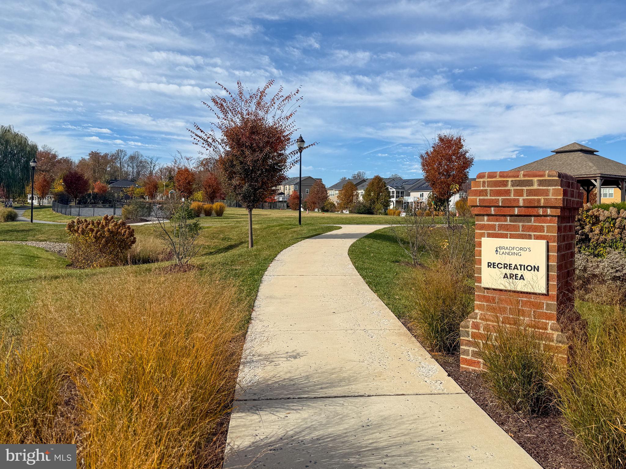15635 Trolley Lane Silver Spring, MD 20906 - Photo 32 of 41 a view of a lake with a building in the background