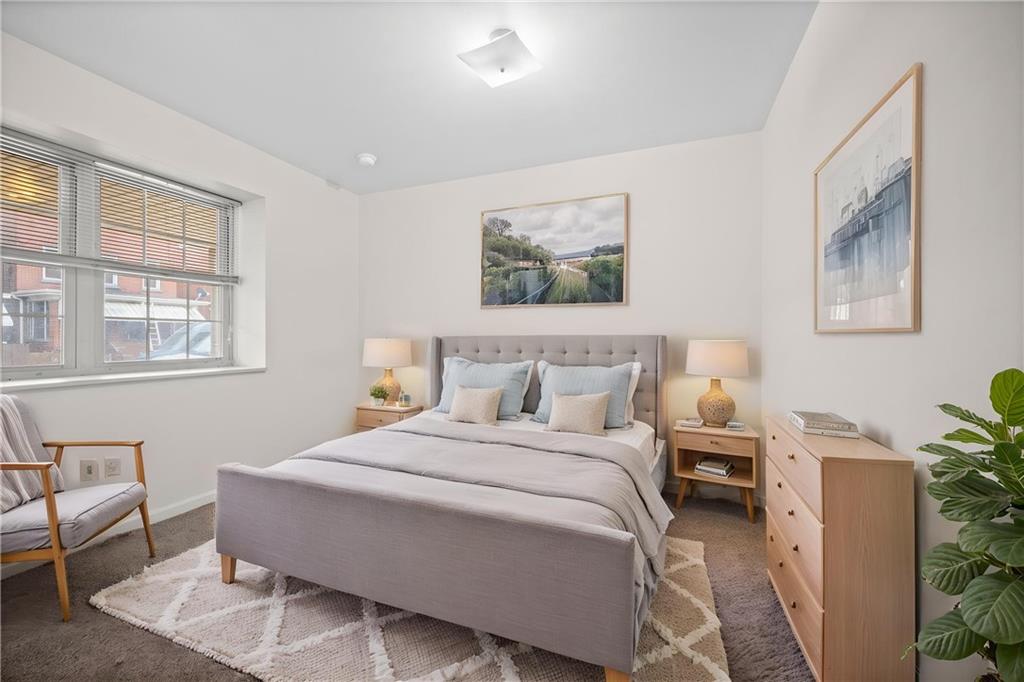 311 Catherine Street McKees Rocks, PA 15136 - Photo 11 of 41 a bedroom with bed and a window