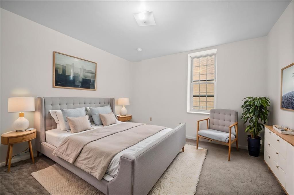 311 Catherine Street McKees Rocks, PA 15136 - Photo 14 of 41 a bedroom with a bed and a couch