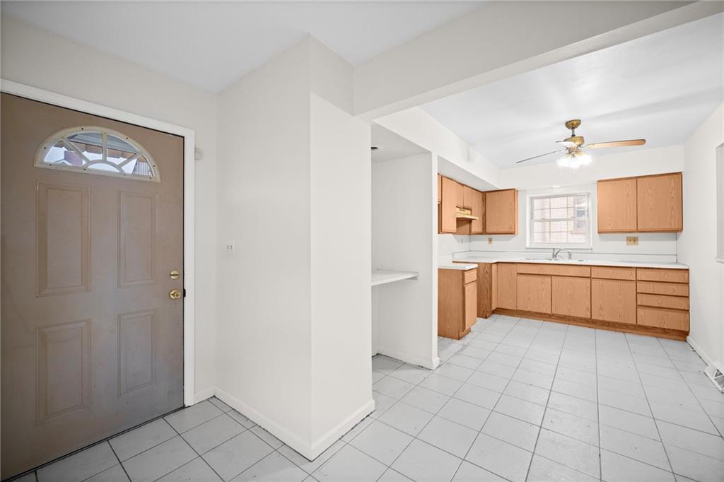 311 Catherine Street McKees Rocks, PA 15136 - Photo 19 of 41 a kitchen with a cabinets and appliances