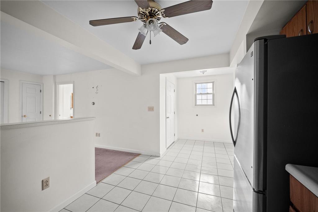 311 Catherine Street McKees Rocks, PA 15136 - Photo 21 of 41 a view of empty room with window and ceiling fan