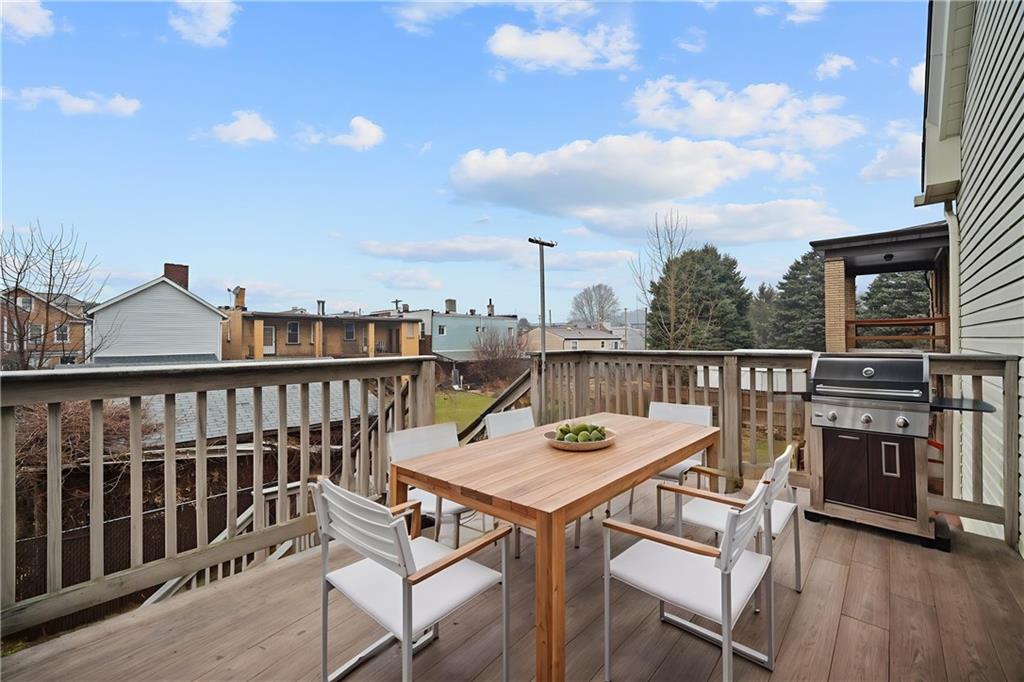 311 Catherine Street McKees Rocks, PA 15136 - Photo 32 of 41 a view of a chairs and table on the deck