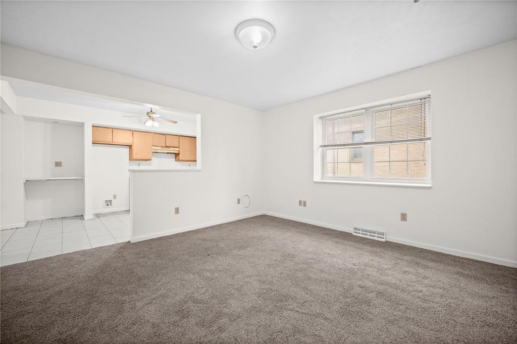 311 Catherine Street McKees Rocks, PA 15136 - Photo 6 of 41 an empty room with windows
