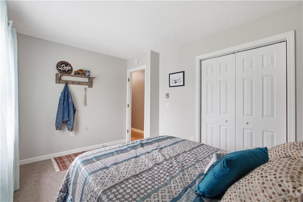 87 Broad Street Marianna, PA 15345 - Photo 20 of 37 a bedroom with a bed and a painting