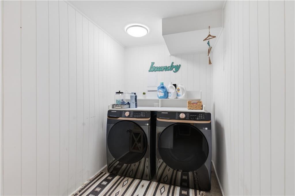 87 Broad Street Marianna, PA 15345 - Photo 25 of 37 a utility room with dryer and washer