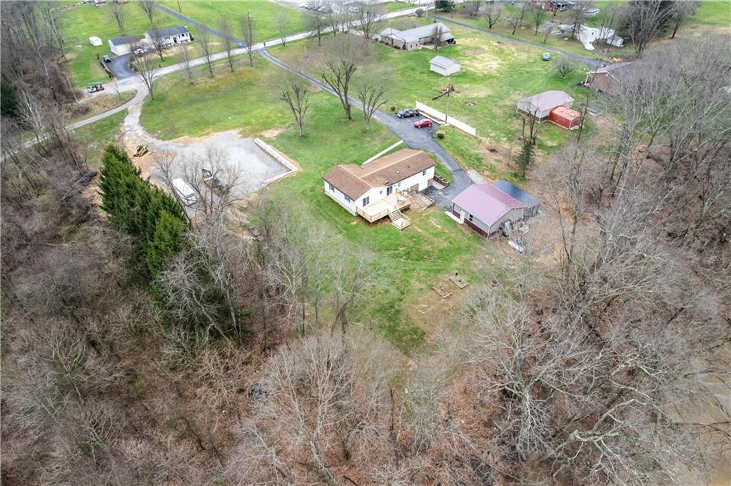 87 Broad Street Marianna, PA 15345 - Photo 34 of 37 an aerial view of residential houses with outdoor space