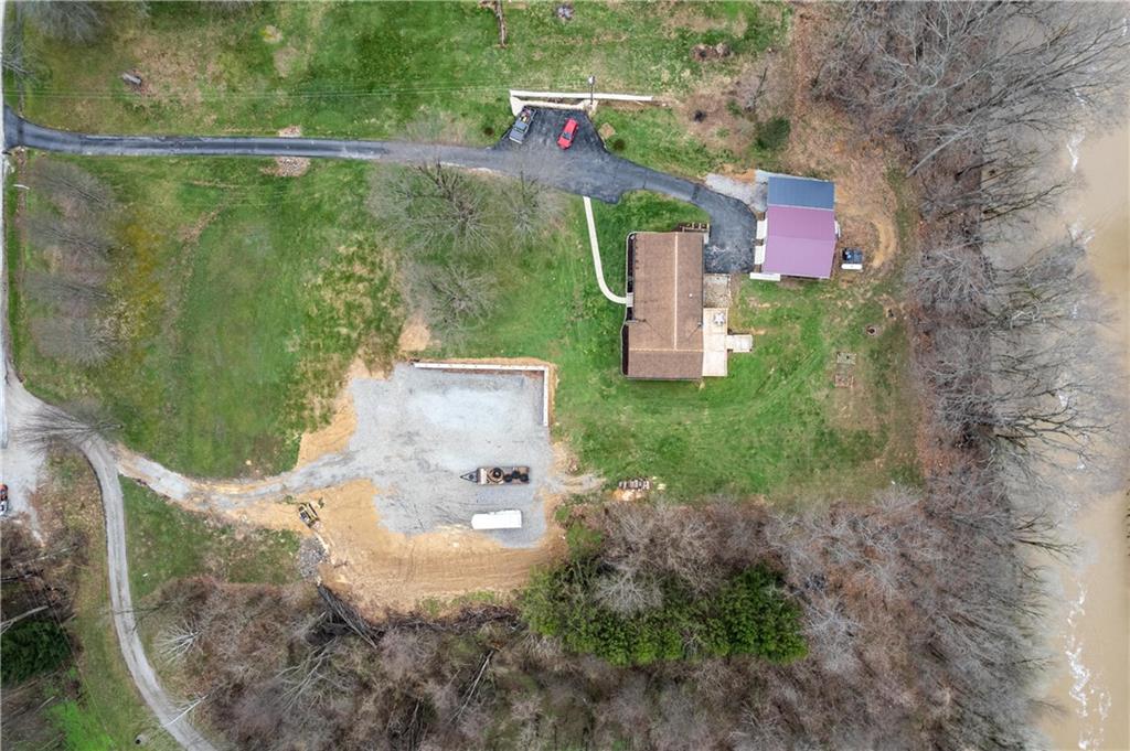 87 Broad Street Marianna, PA 15345 - Photo 35 of 37 an aerial view of a house with outdoor space