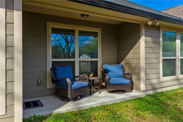 a building outdoor space with patio furniture