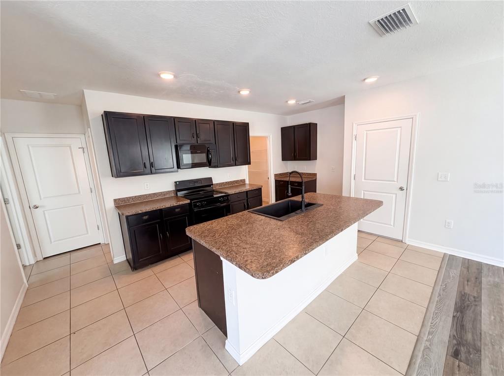 10225 Mangrove Well Road Sun City Center, FL 33573 - Photo 2 of 35