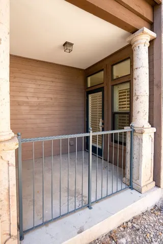a spacious bathroom with a tub sink shower and mirror