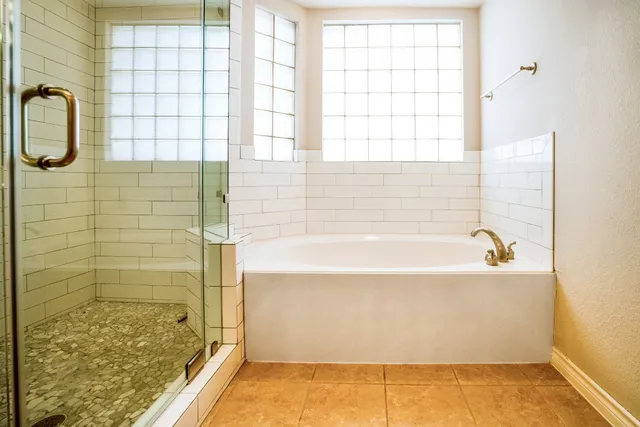 a bathroom with a sink a vanity and a mirror