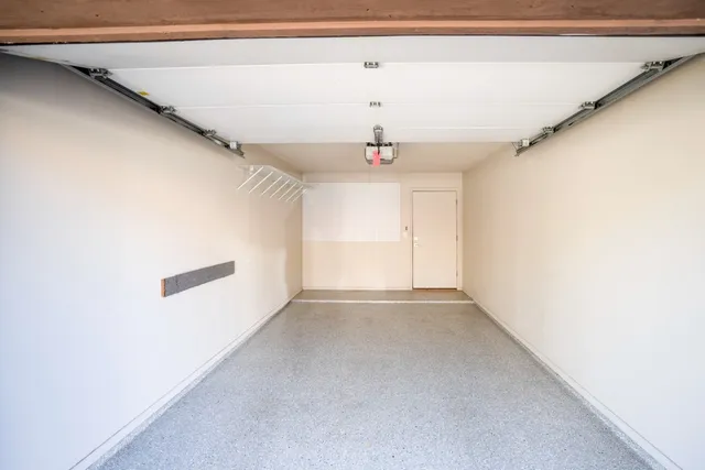 a view of outdoor space with garden and trees