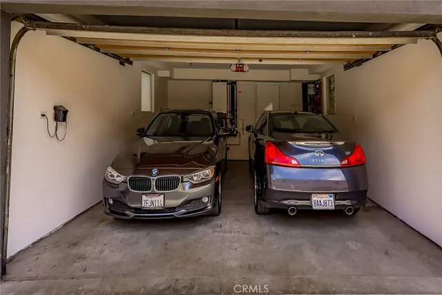 a front view of a house with a garage