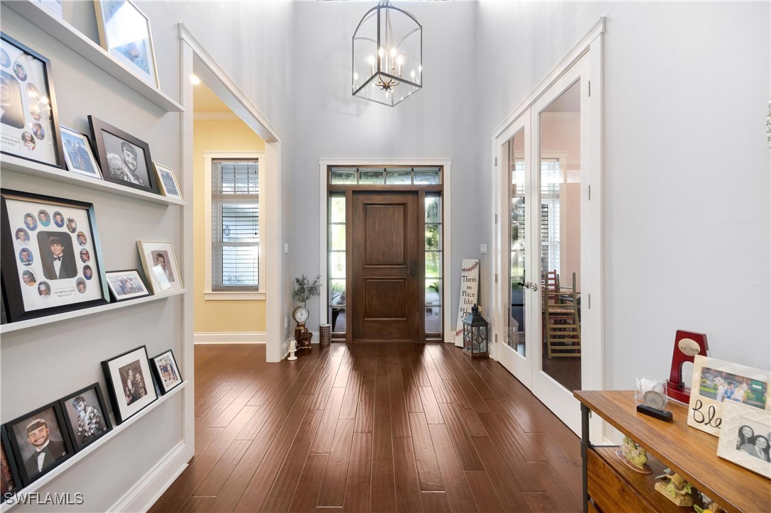 1135 Firebrand Court LaBelle, FL 33935 - Photo 16 of 45 a view of a room with wooden floor