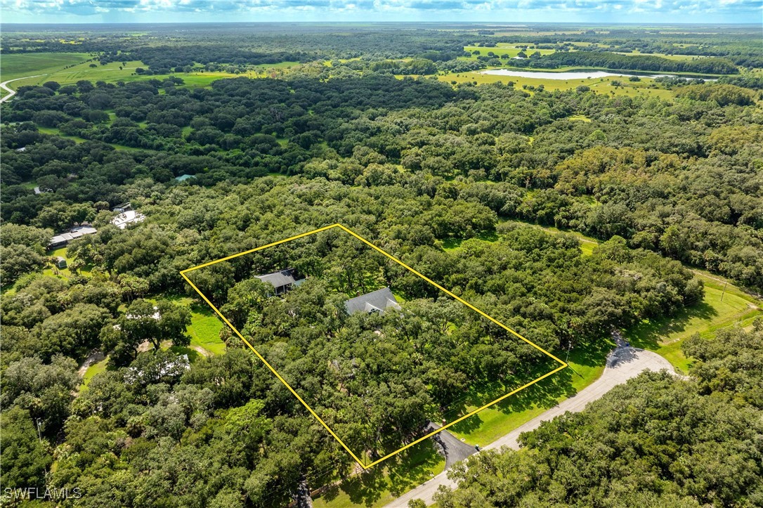 1135 Firebrand Court LaBelle, FL 33935 - Photo 42 of 45 a view of a field with an ocean