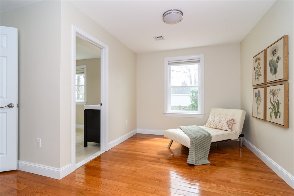 3 Leighton Street Natick, MA 01760 - Photo 18 of 31 a bedroom with a bed and wooden floor